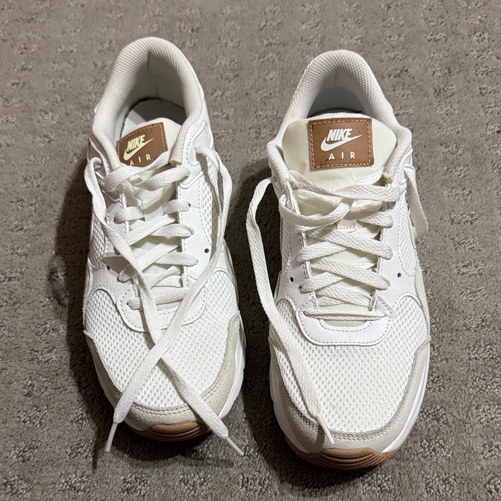 Gently used Women’s Nike White Mesh Sneakers with Tan Leather Logo size 10
